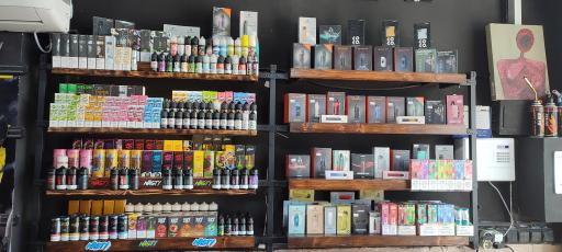 عکس فروشگاه دخانیات و صنایع دستی کرگدن