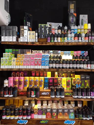 عکس فروشگاه دخانیات و صنایع دستی کرگدن