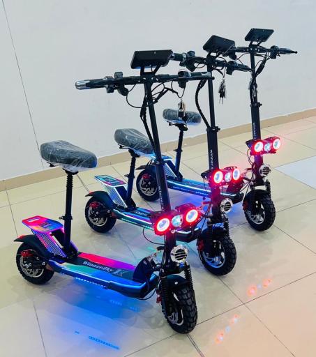 عکس ماشین شارژی اسکوتر برقی  پرشین توکلی