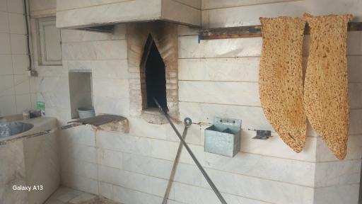 عکس نانوایی سنگک سنتی شقایق