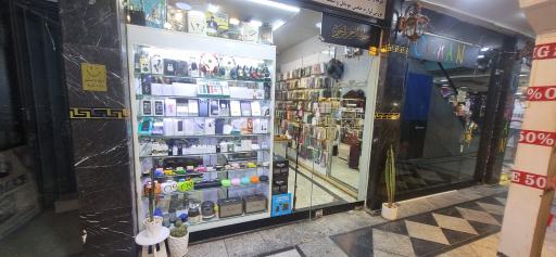 عکس فروشگاه کامیتل