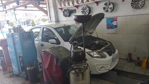 عکس تعویض روغن و آپاراتی برادران نصیری