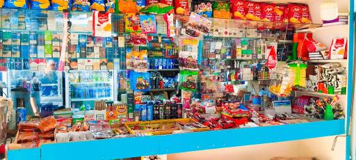 عکس دکه روزنامه فروشی عزیزی