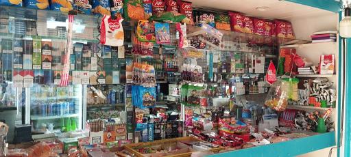 عکس دکه روزنامه فروشی عزیزی