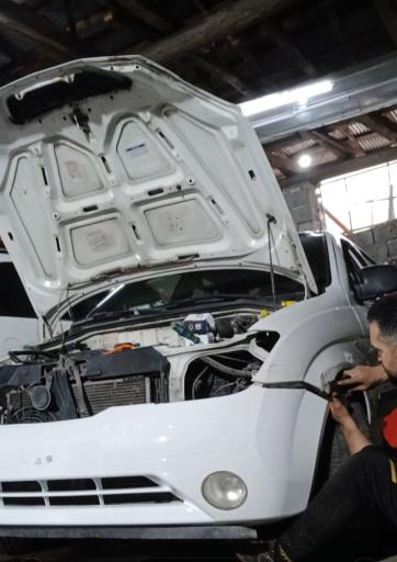 عکس تعمیرگاه اتومبیل علی