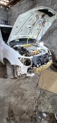 عکس تعمیرگاه اتومبیل علی