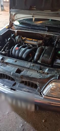 عکس تعمیرگاه اتومبیل علی