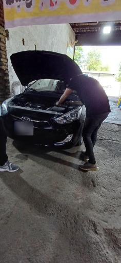 عکس تعمیرگاه اتومبیل علی