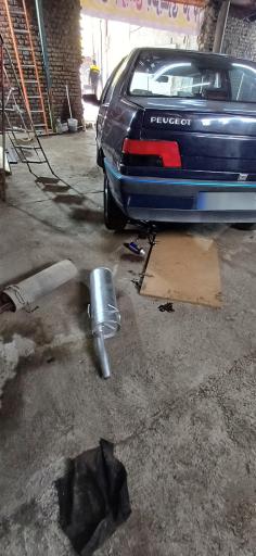 عکس تعمیرگاه اتومبیل علی