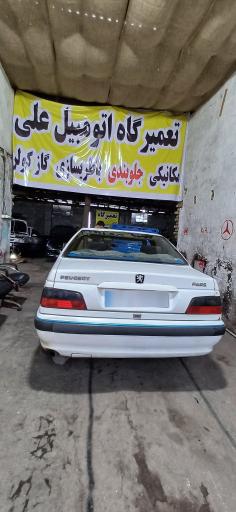 عکس تعمیرگاه اتومبیل علی