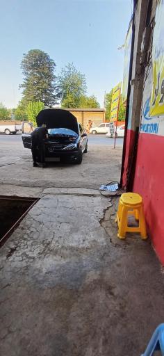 تعمیرگاه اتومبیل علی