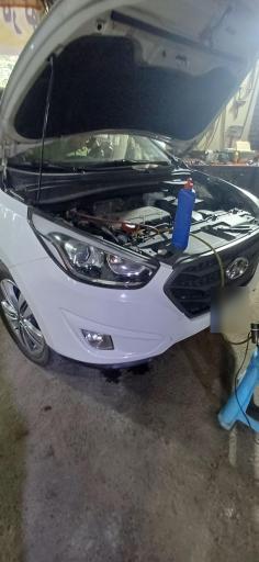 تعمیرگاه اتومبیل علی