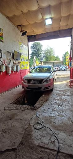 عکس تعمیرگاه اتومبیل علی