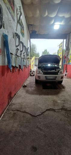 عکس تعمیرگاه اتومبیل علی