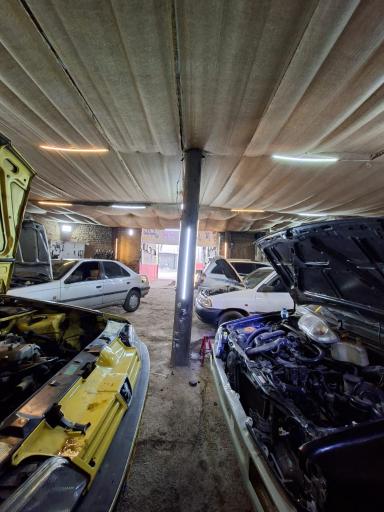 تعمیرگاه اتومبیل علی