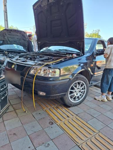 عکس تعمیرگاه اتومبیل علی
