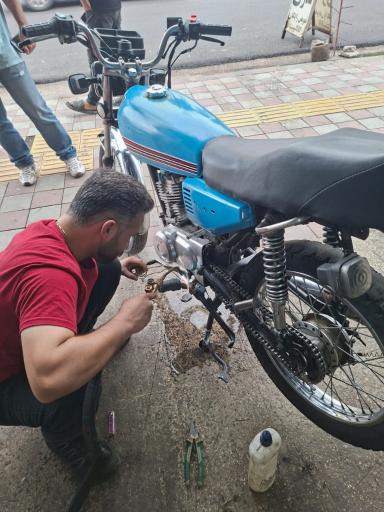 عکس تعمیرگاه اتومبیل علی