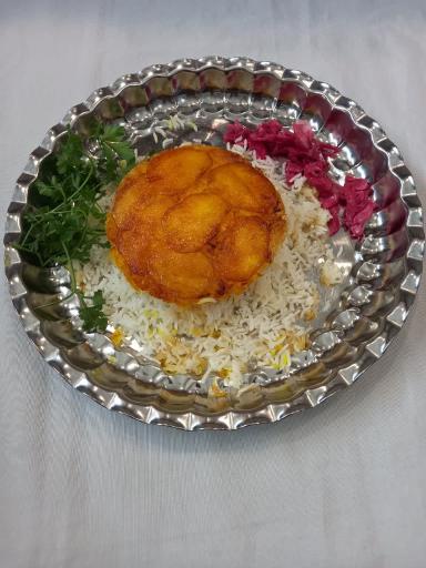 عکس تهیه غذای دنیای ته‌چین