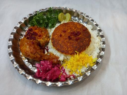 عکس تهیه غذای دنیای ته‌چین