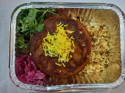 عکس تهیه غذای دنیای ته‌چین