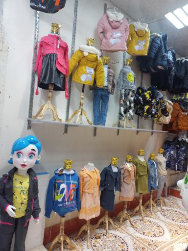 عکس فروشگاه لباس کودک سنامد 