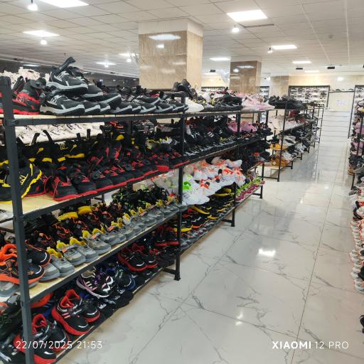 عکس فروشگاه کفش آرجی