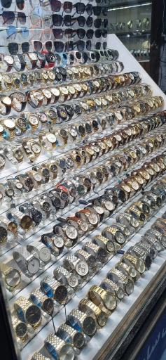 عکس ساعت و عینک میداس