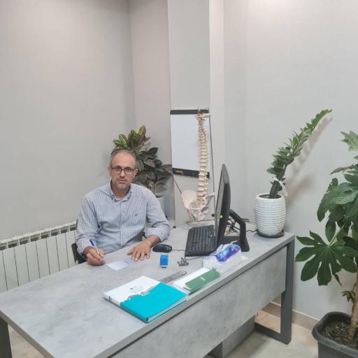 عکس دکتر حمید حصاری کیا فوق تخصص جراحی ستون فقرات