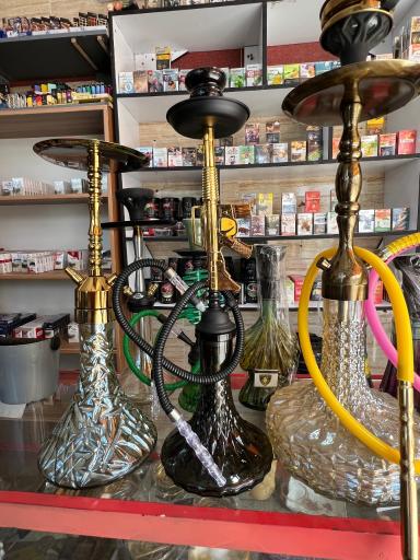 عکس فروشگاه عمده پخش تنباکو و زغال و سیگار آدلیا