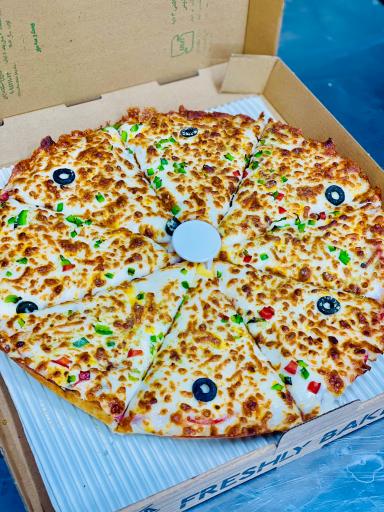 عکس سیترا سوخاری کیلویی و پیتزا