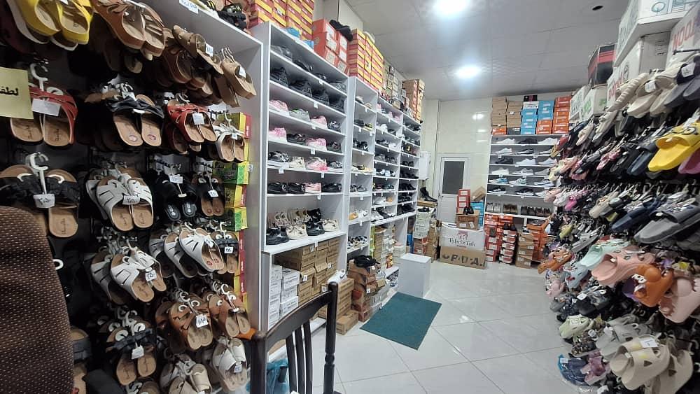 عکس فروشگاه کیف و کفش نصف قیمت