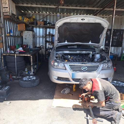 عکس مکانیکی تخصصی انواع خودرو ایرانی و خارجی استاد محمد