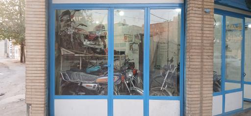 عکس فروشگاه موتور سیکلت صادقی