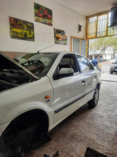 عکس تعمیر جلوبندی و تنظبم فرمان پیوندی