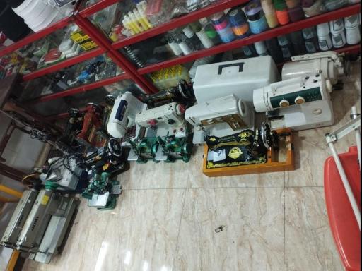 عکس خرازی و تعمیرات چرخ خیاطی جنابی