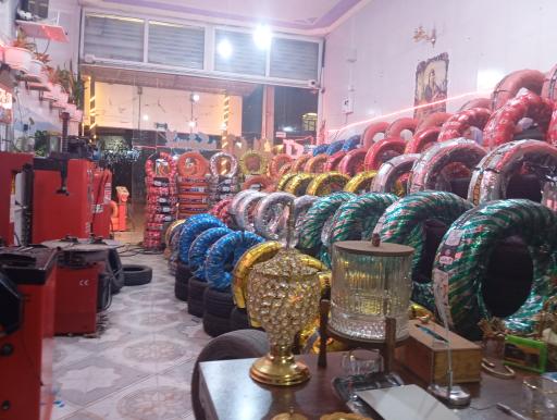 عکس بازرگانی رینگ و لاستیک آکو چمنی