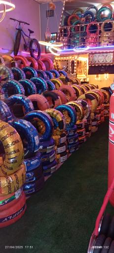 عکس بازرگانی رینگ و لاستیک آکو چمنی