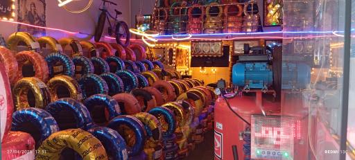 عکس بازرگانی رینگ و لاستیک آکو چمنی