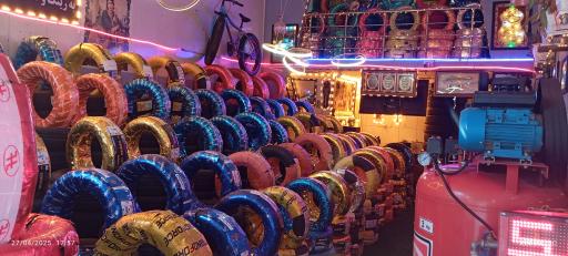 عکس بازرگانی رینگ و لاستیک آکو چمنی