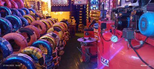 عکس بازرگانی رینگ و لاستیک آکو چمنی