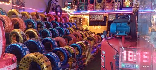 عکس بازرگانی رینگ و لاستیک آکو چمنی