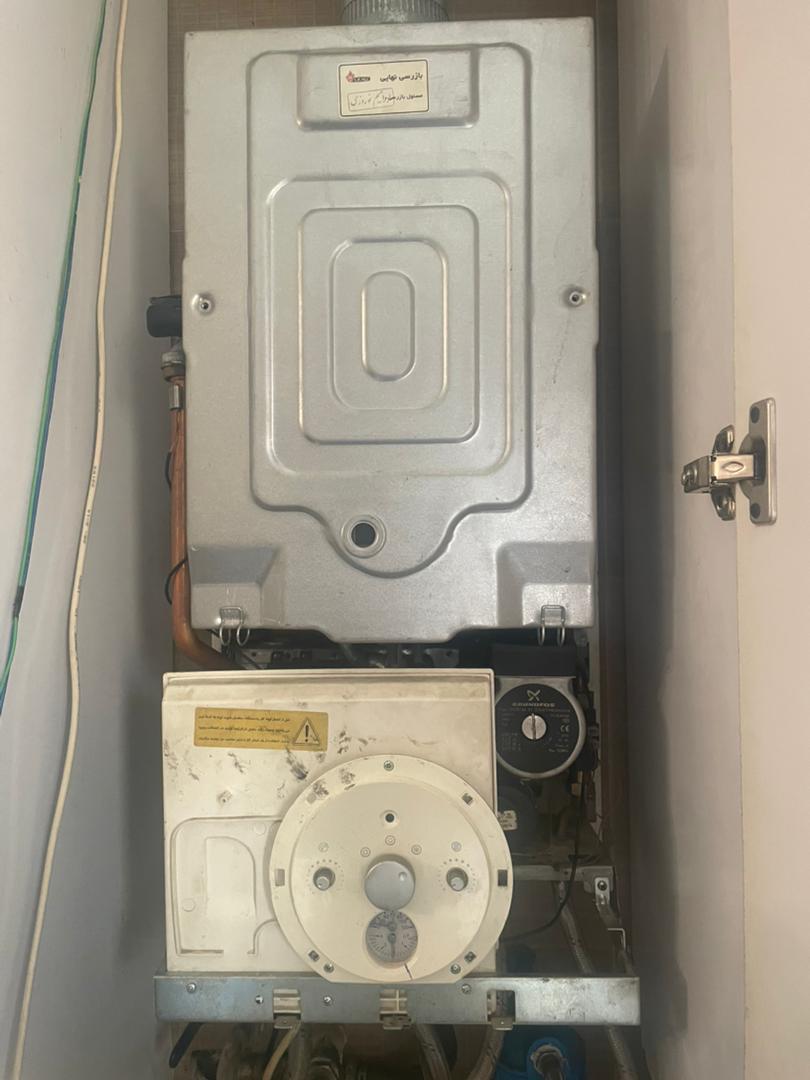 عکس تعمیرات نصب و سرویس پکیج و کولرگازی آبگرمکن رادیاتور