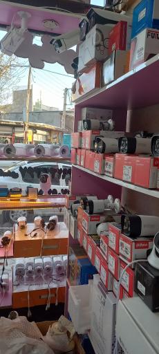 عکس دوربین مداربسته و دستگاه کارتخوان اسدی