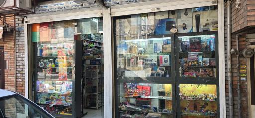 عکس خدمات کامپیوتر و لوازم تحریر اعتماد