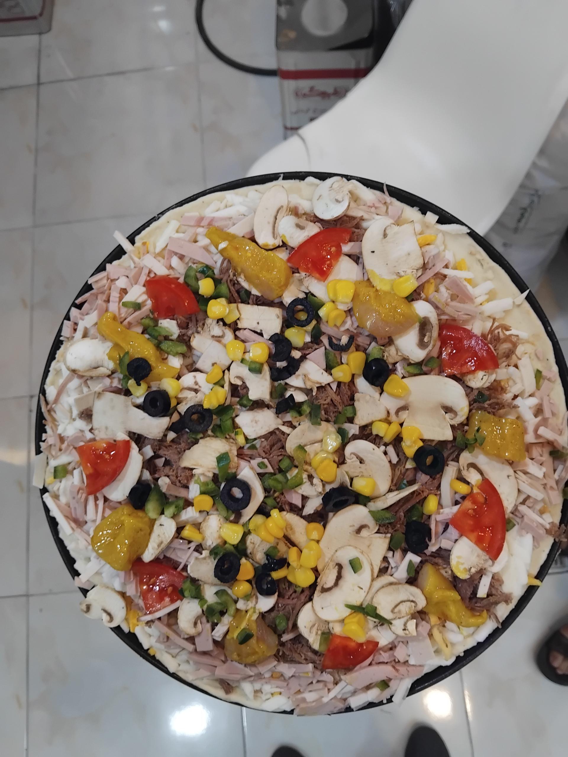 عکس پیتزا معرکه