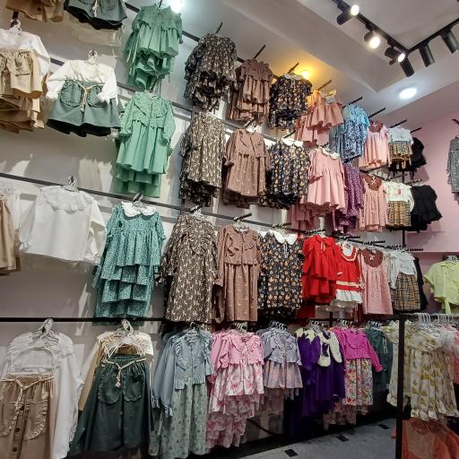 عکس پوشاک کودک کوپیدو 