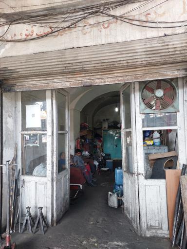 عکس تعمیرگاه اطمینان