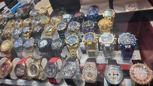 عکس ساعت و عطر کاملیا