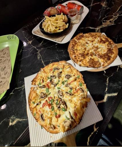 عکس پیتزا دومینوز