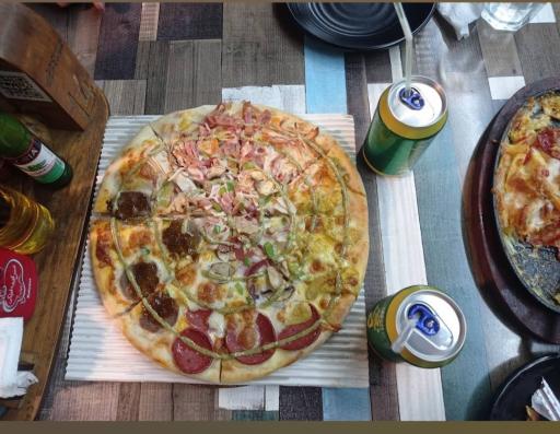 عکس پیتزا دومینوز